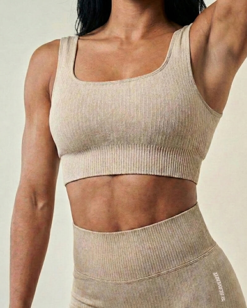 Brassière de sport haut de sport femme Beige ensemble tendance style et confort, conçue pour offrir un maintien supérieur pendant vos entraînements les plus intenses