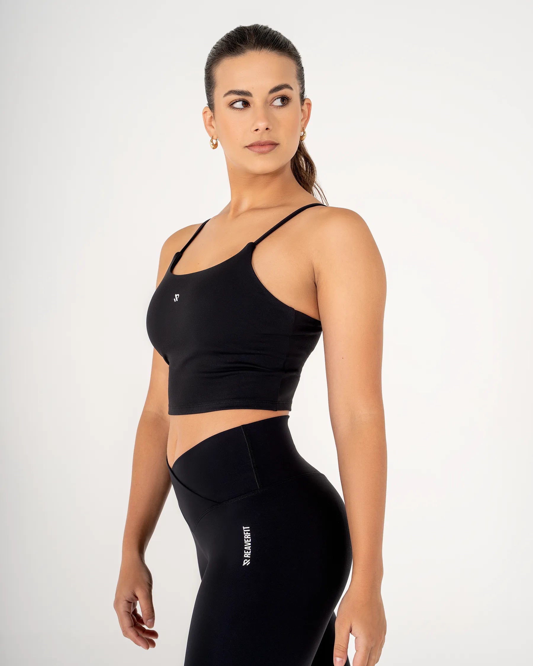 Débardeur MYRA noir Reaverfit pour femme avec brassière intégrée parfait pour le cardio vue de profil