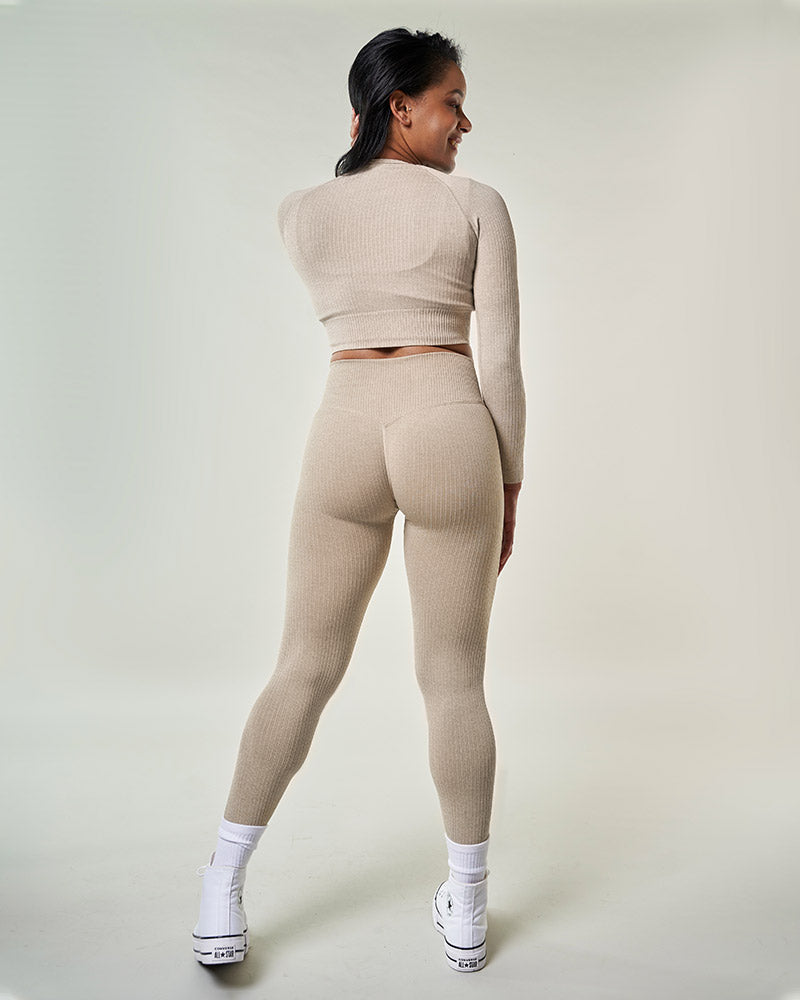 Haut de sport manches longues femme Beige sexy une sensation de confort tout en offrant un soutien adapté lors de vos séances de sport