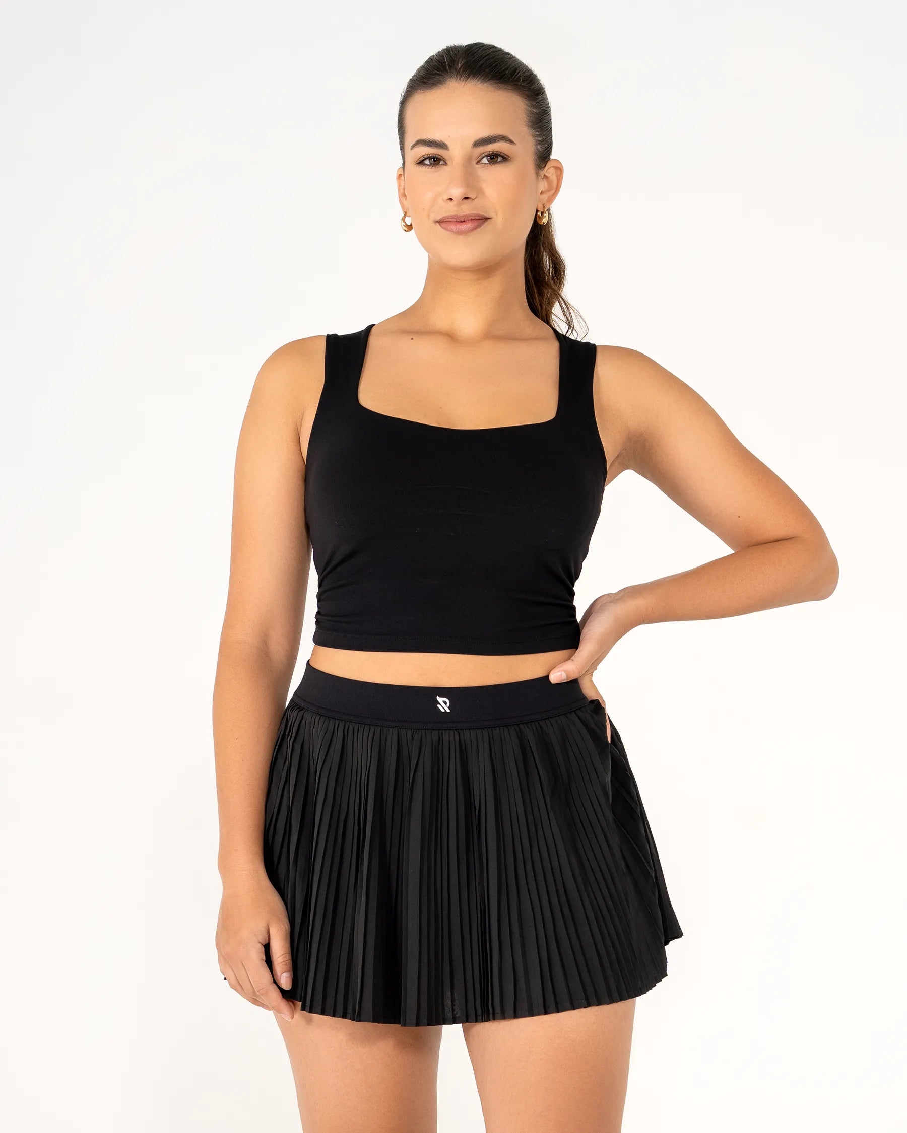 Jupe-short Tennis Club noire Reaverfit pour femme parfaite pour le tennis