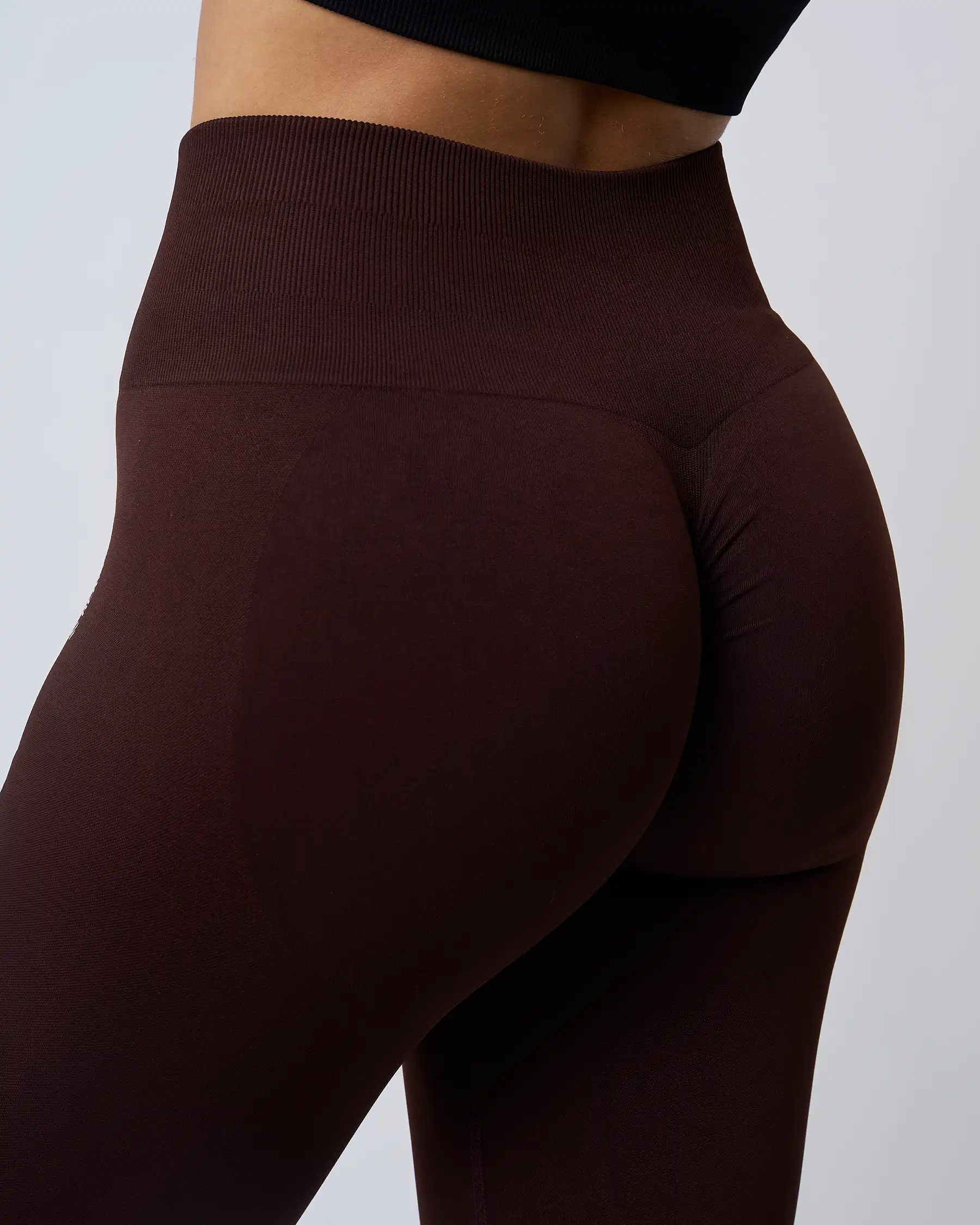 Zoom sur l'arrière du legging sport Sculpt Expresso push-up, soulignant l'effet push-up