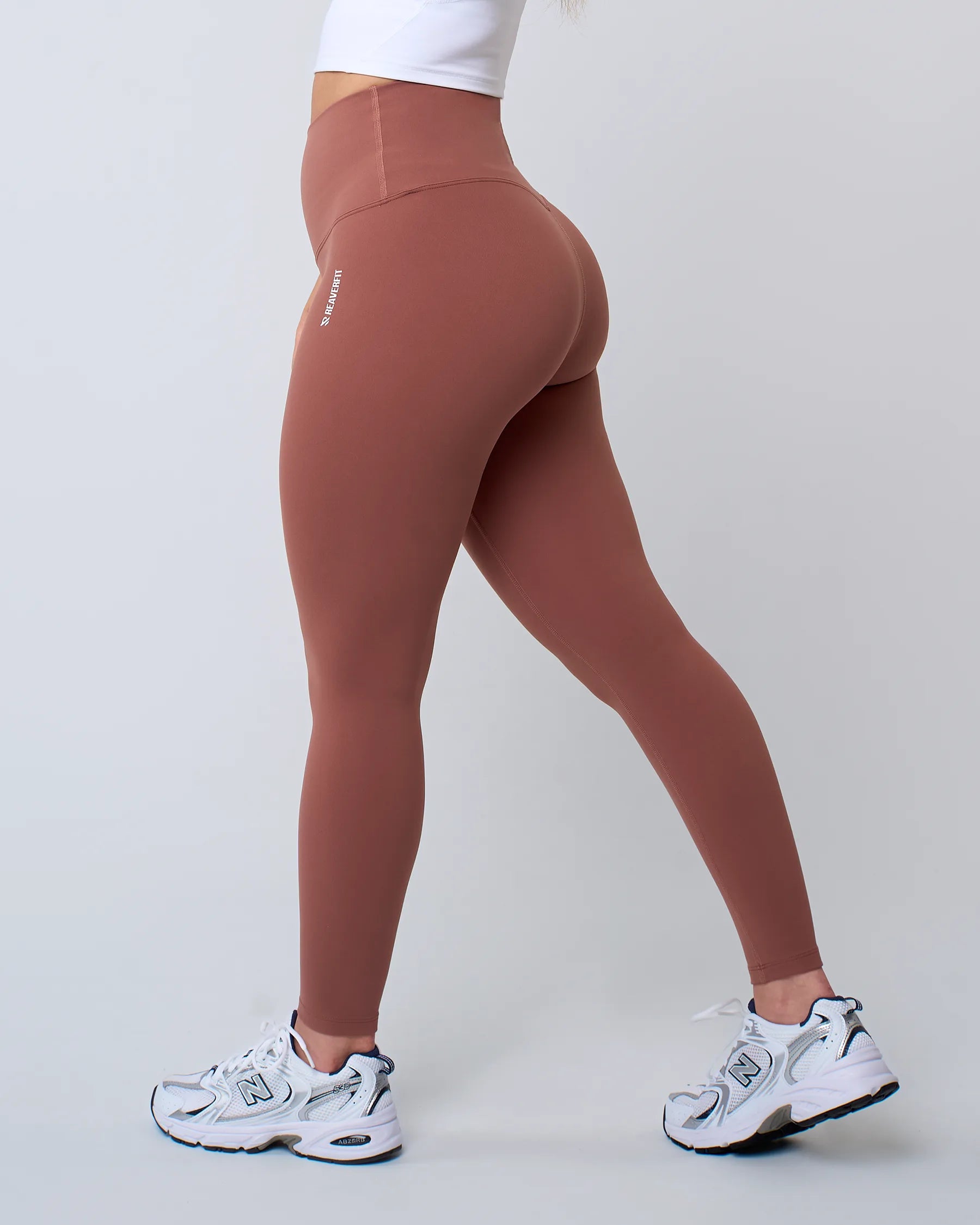 Legging de sport blush LUXE pour femme, taille haute, extensible et confortable, parfait pour les séances de fitness.