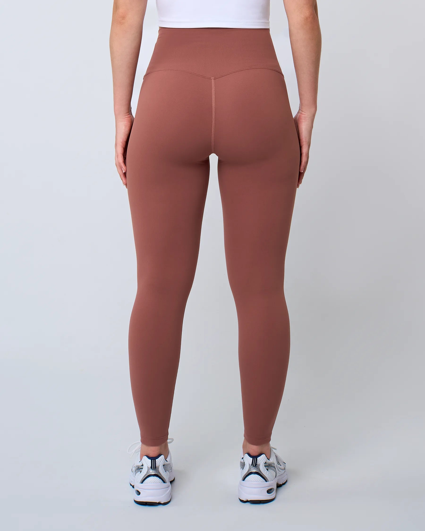 Legging de sport blush LUXE pour femme, dos, gainant et opaque, offrant un maintien parfait pour la musculation.