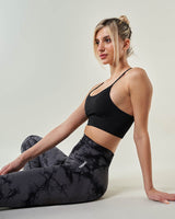 Tenue de sport femme,legging taille haute tendance et brassiere de sport noir pour un look athlétique et chic, parfaite pour une séance de fitness ou de yoga