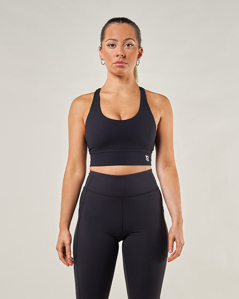 Brassière de sport longue noir design moderne athleisure et activewear Reaverfit 2023