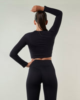 Haut de sport manche longue femme COCOON Noir - Alliant confort, légèreté et flexibilité pour accompagner vos entraînements intensifs musculation fitness yoga
