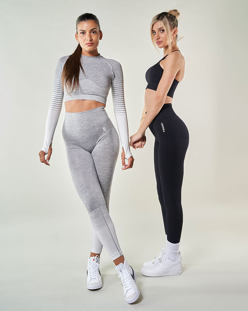 Deux femmes en tenue de sport athleisure et activewear Crop Top brassiere de sport et leggings taille haute sexy - Exemple de style athlétique chic